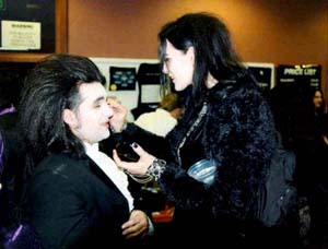 Rock star make-up session. Mojca from Clan Of Xymox and Dominic LaVey of Nosferatu at Whitby, November 2000. Photo by Olga K.