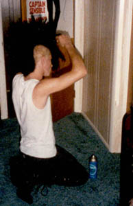Chris praying to the Aquanet God, Greg's apartment, Aug.1985